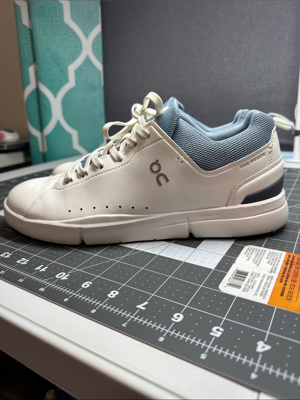 On Running Kids Leather Sneaker in Off-White with Light Blue Collar